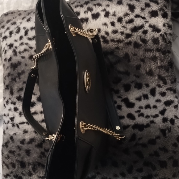 Black and gold chained Michael Kors large handbag. Used a few times. - Picture 5 of 9